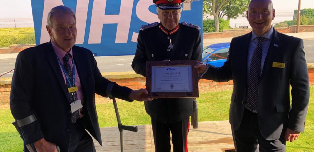 Northern Lincolnshire and Goole NHS Foundation Trust CEO Peter Reading (left) and the trusts’ Veteran’s Champion, Deputy Director of Estates and Facilities, Simon Tighe (right) receiving the award from Lord-Lieutenant Mr Toby Dennis.